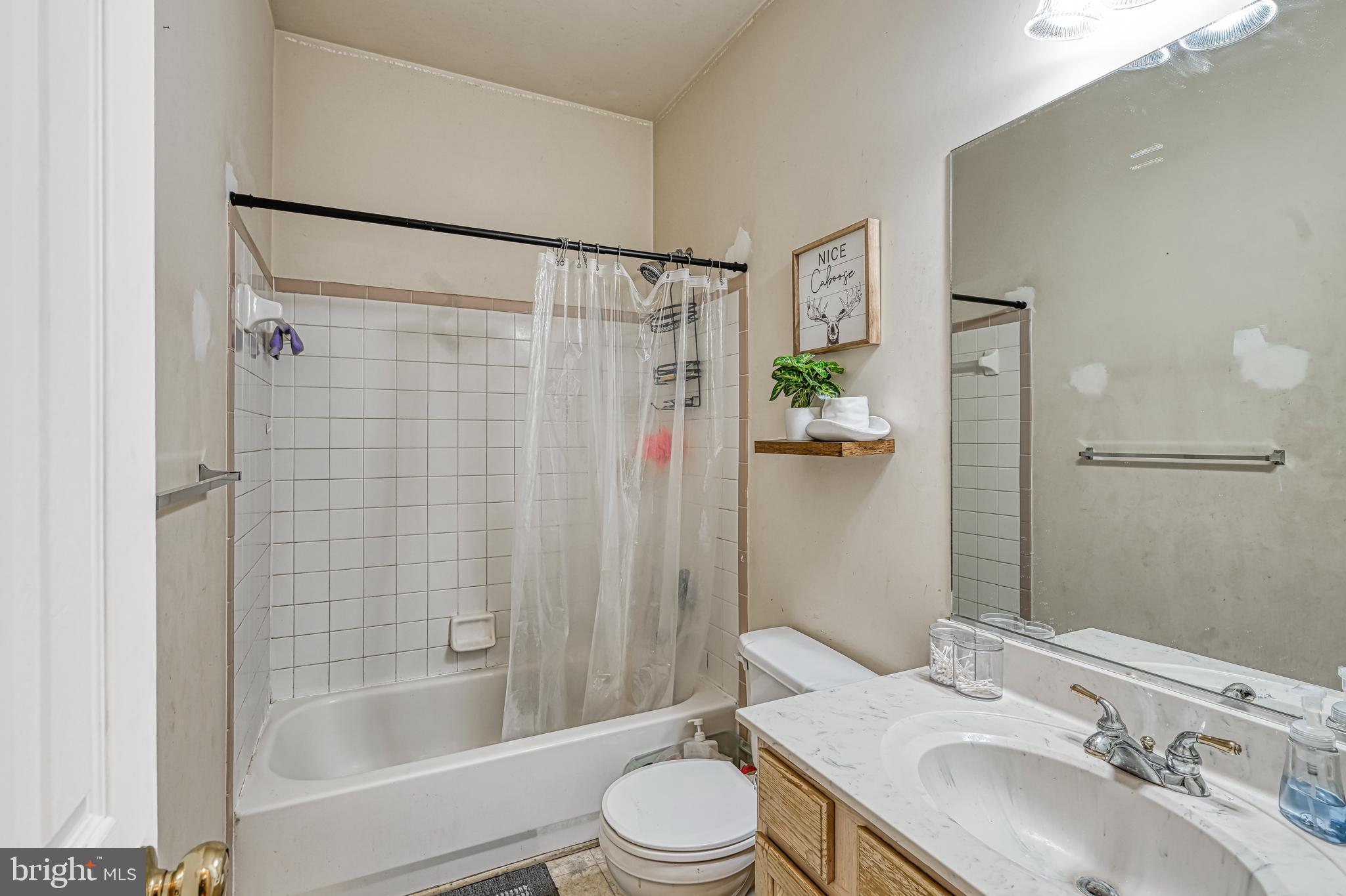 441 Hartwood Road Fredericksburg, VA 22406 - Photo 7 of 58 a bathroom with a sink toilet and shower