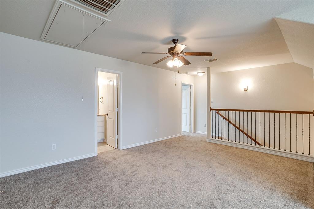 1225 Drummond Circle Waco, TX 76712 - Photo 24 of 40 a view of a hallway with a ceiling fan