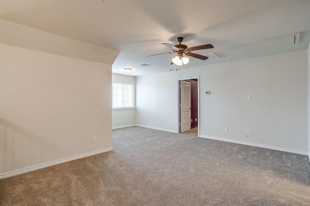 1225 Drummond Circle Waco, TX 76712 - Photo 25 of 40 an empty room with fan and windows