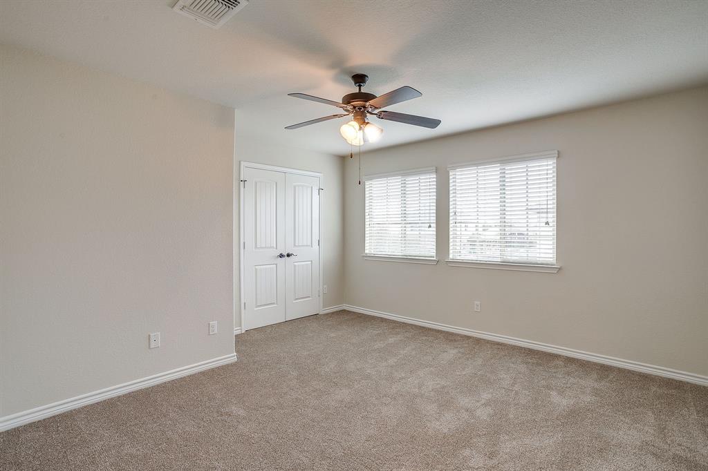 1225 Drummond Circle Waco, TX 76712 - Photo 26 of 40 an empty room with windows and fan
