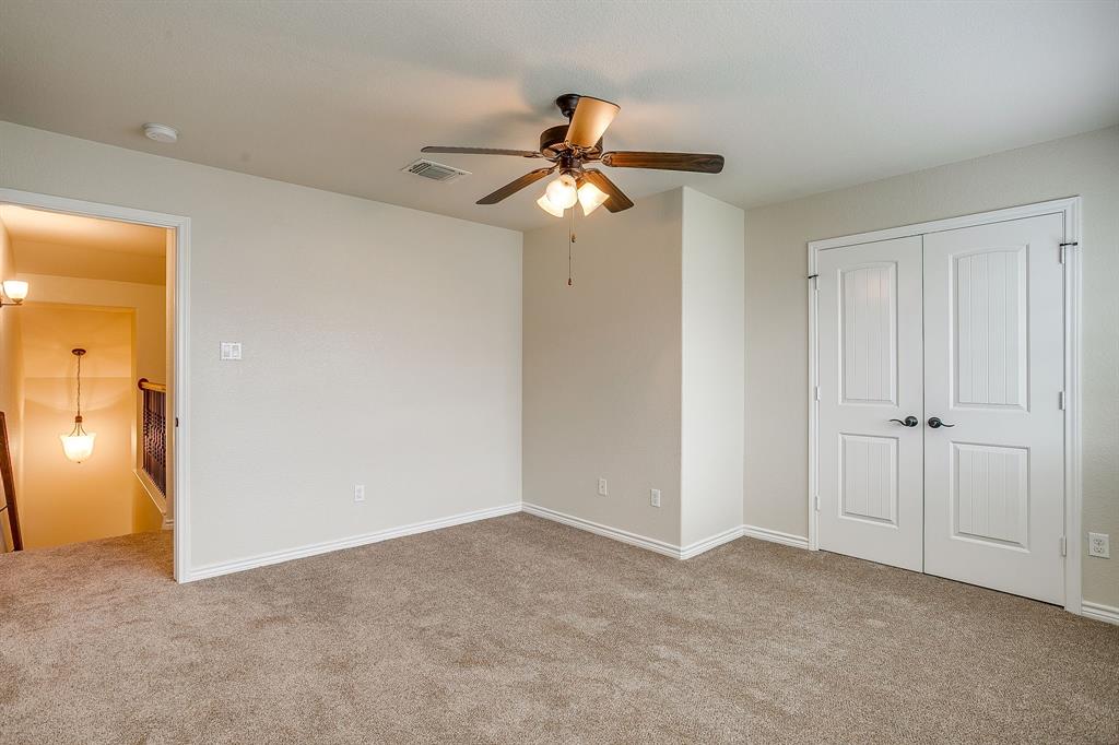 1225 Drummond Circle Waco, TX 76712 - Photo 27 of 40 a view of a livingroom with a chandelier fan
