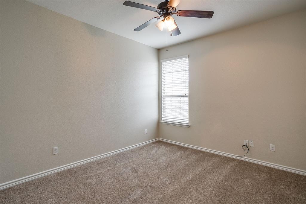 1225 Drummond Circle Waco, TX 76712 - Photo 31 of 40 an empty room with a window and a fan
