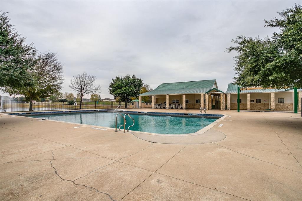 1225 Drummond Circle Waco, TX 76712 - Photo 40 of 40 a view of house with swimming pool and background