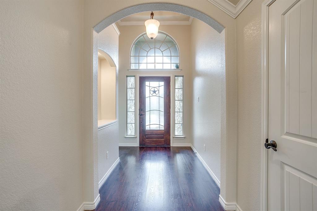 1225 Drummond Circle Waco, TX 76712 - Photo 5 of 40 wooden view of entryway with wooden floor