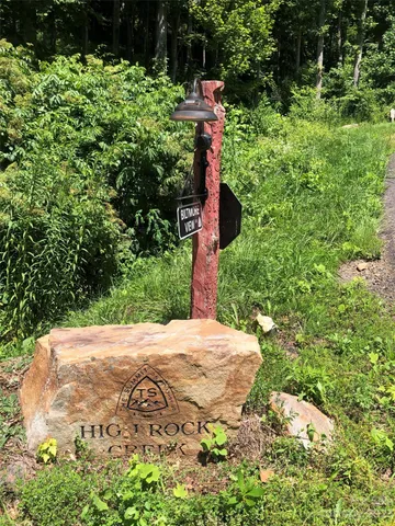 a view of a backyard of the house