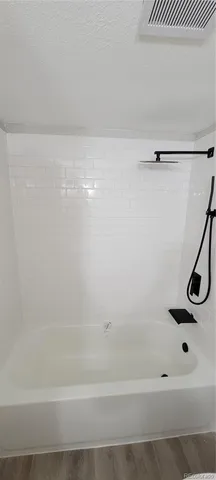 a bathroom with a bathtub