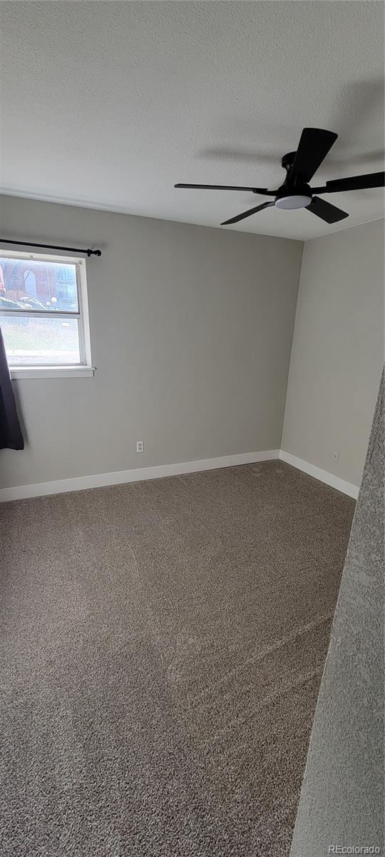 12140 Huron Street, Unit 101 Denver, CO 80234 - Photo 13 of 19 a view of a room with racks on the wall