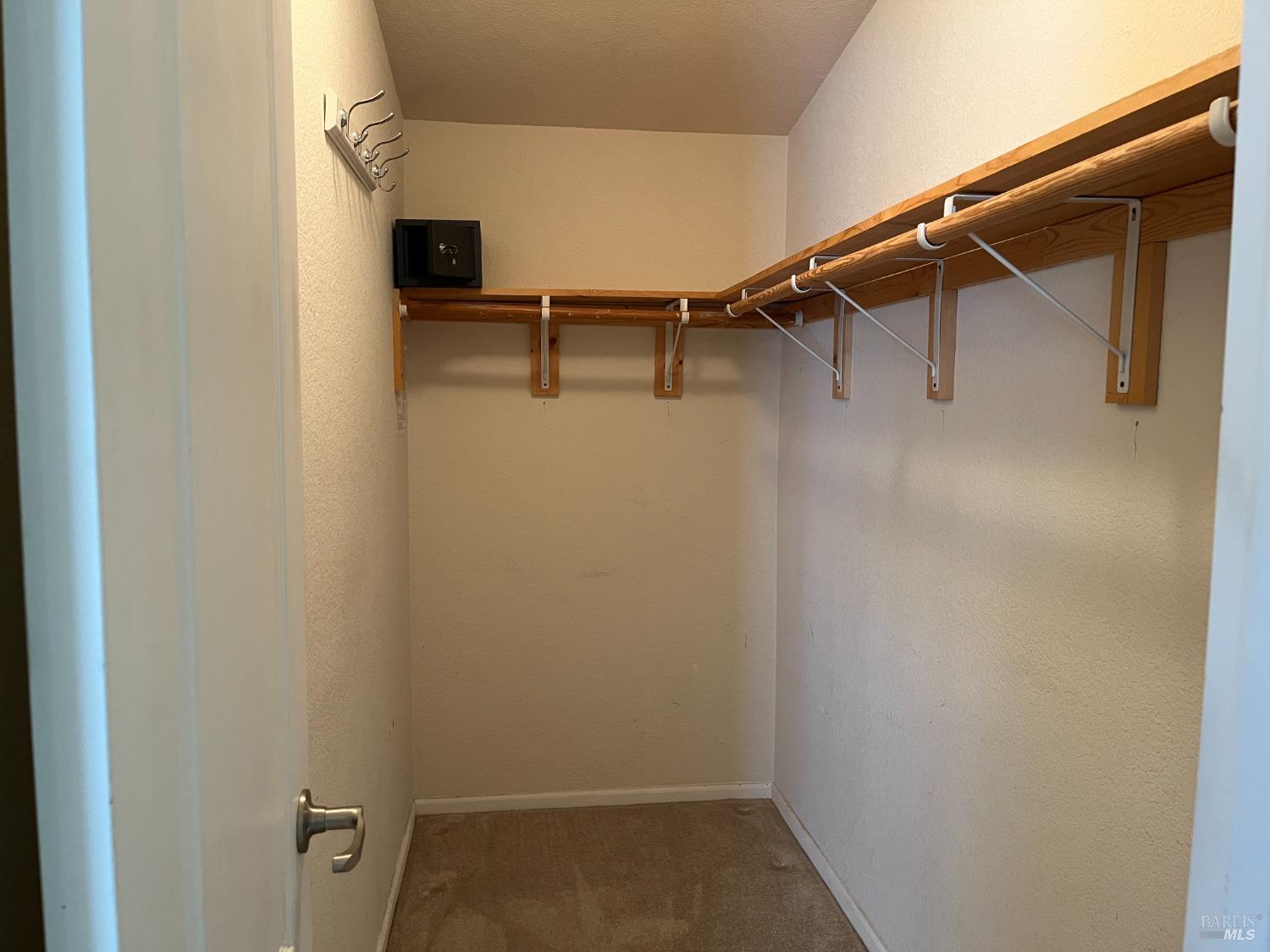 54 Norfolk Drive Santa Rosa, CA 95401 - Photo 12 of 57 a view of a room with racks on the wall