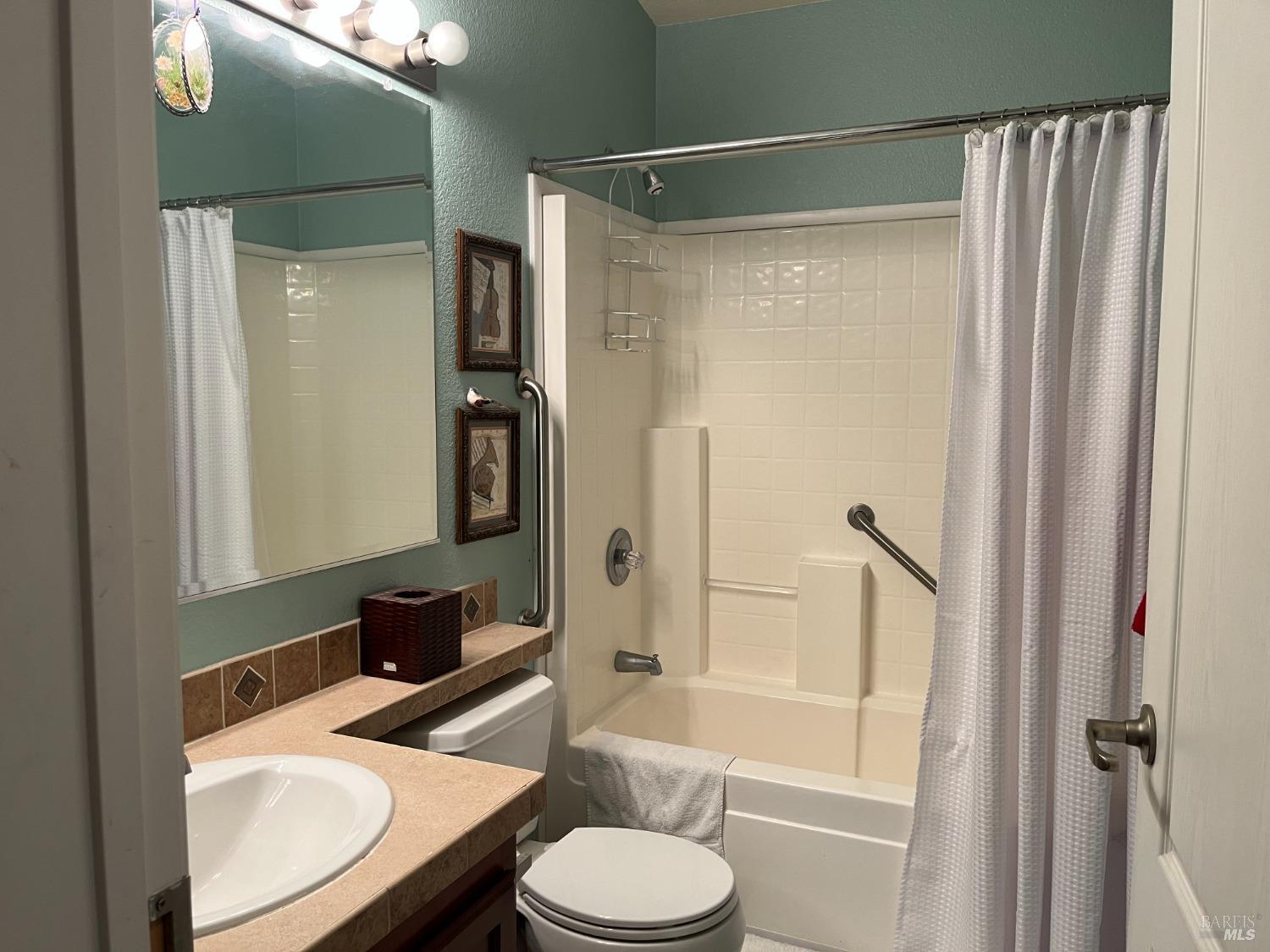 54 Norfolk Drive Santa Rosa, CA 95401 - Photo 17 of 57 a bathroom with a sink toilet and shower