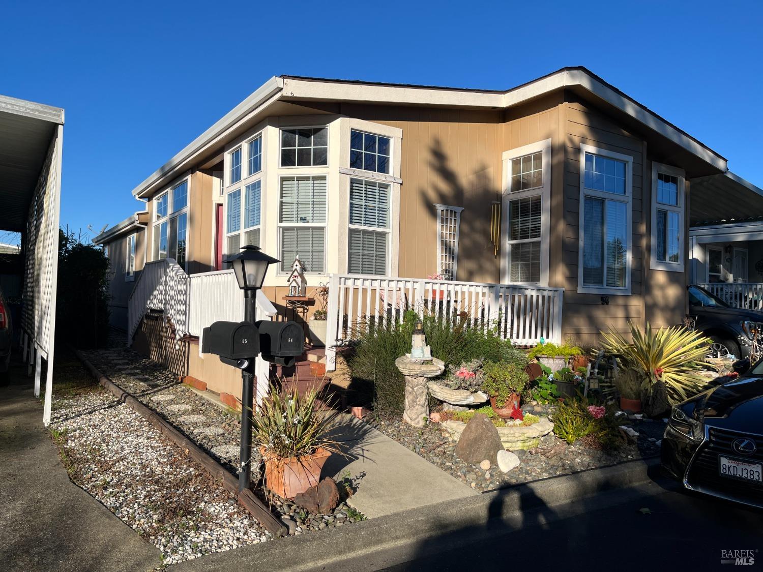54 Norfolk Drive Santa Rosa, CA 95401 - Photo 2 of 57 a front view of a house with a yard