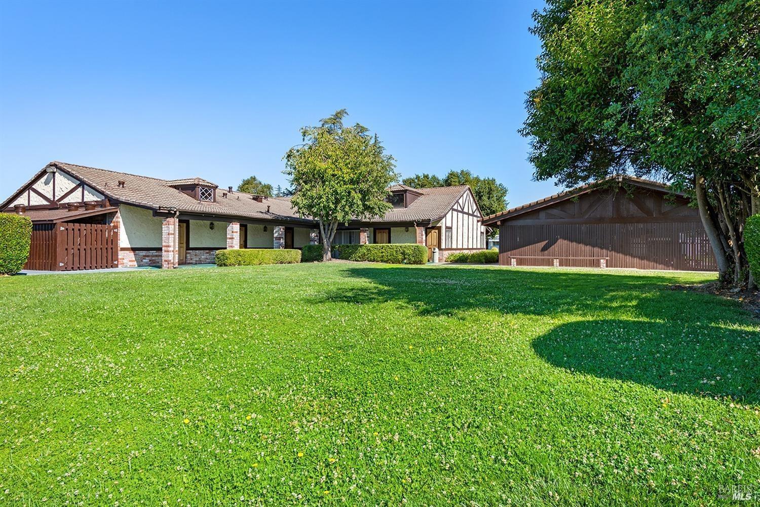 54 Norfolk Drive Santa Rosa, CA 95401 - Photo 46 of 57 a front view of a house with garden