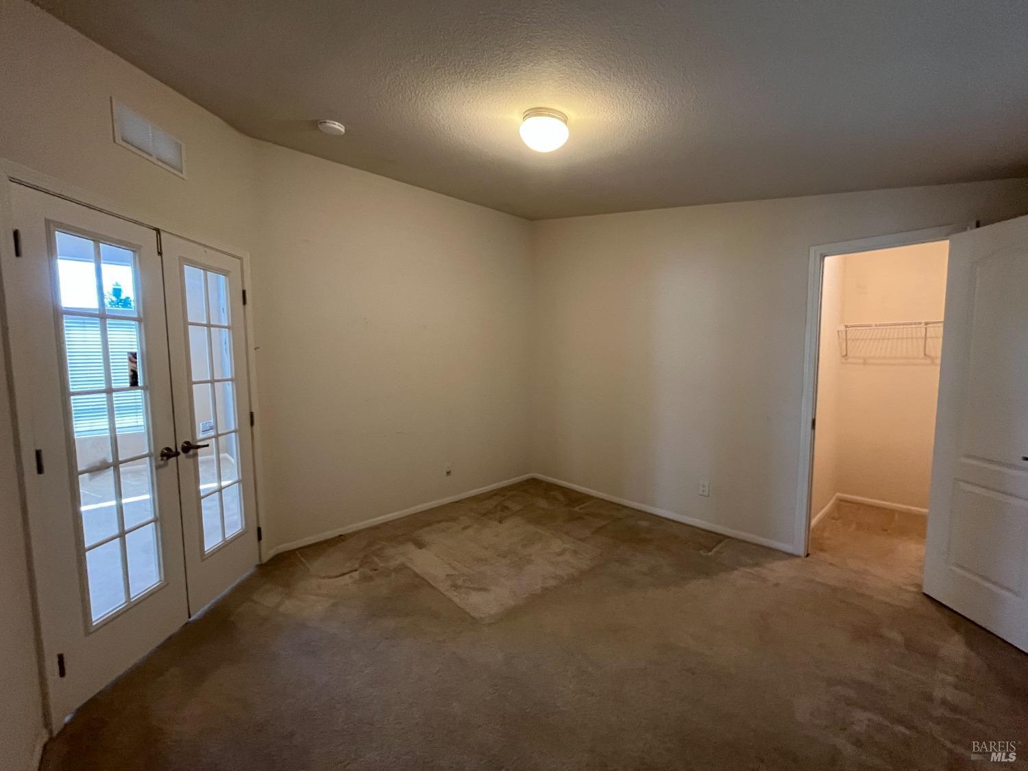 54 Norfolk Drive Santa Rosa, CA 95401 - Photo 10 of 57 an empty room with windows