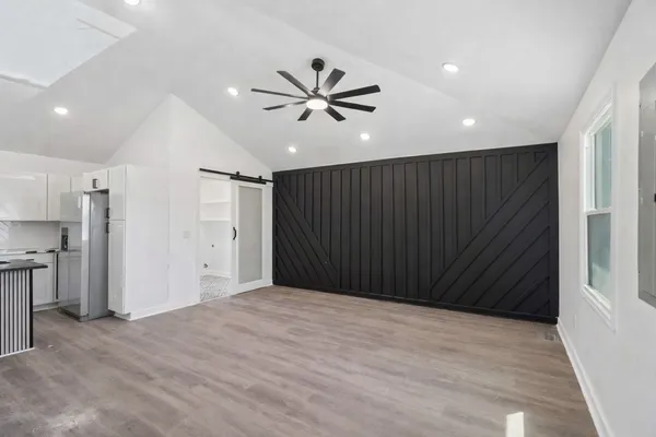 a view of a big room with wooden cabinet