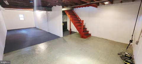 a kitchen with stainless steel appliances granite countertop a stove and a refrigerator