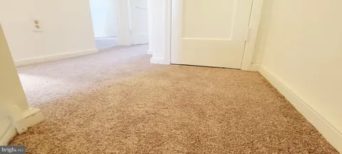 a view of a window in an empty room