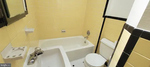 a car parked in front of a brick building