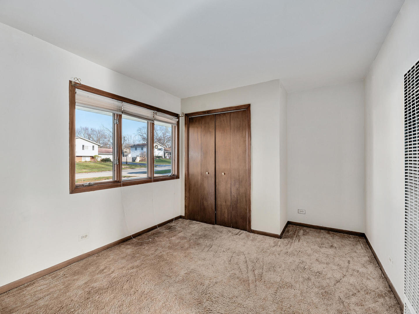 21W241 Coronet Road Lombard, IL 60148 - Photo 13 of 24 a view of an empty room with a window