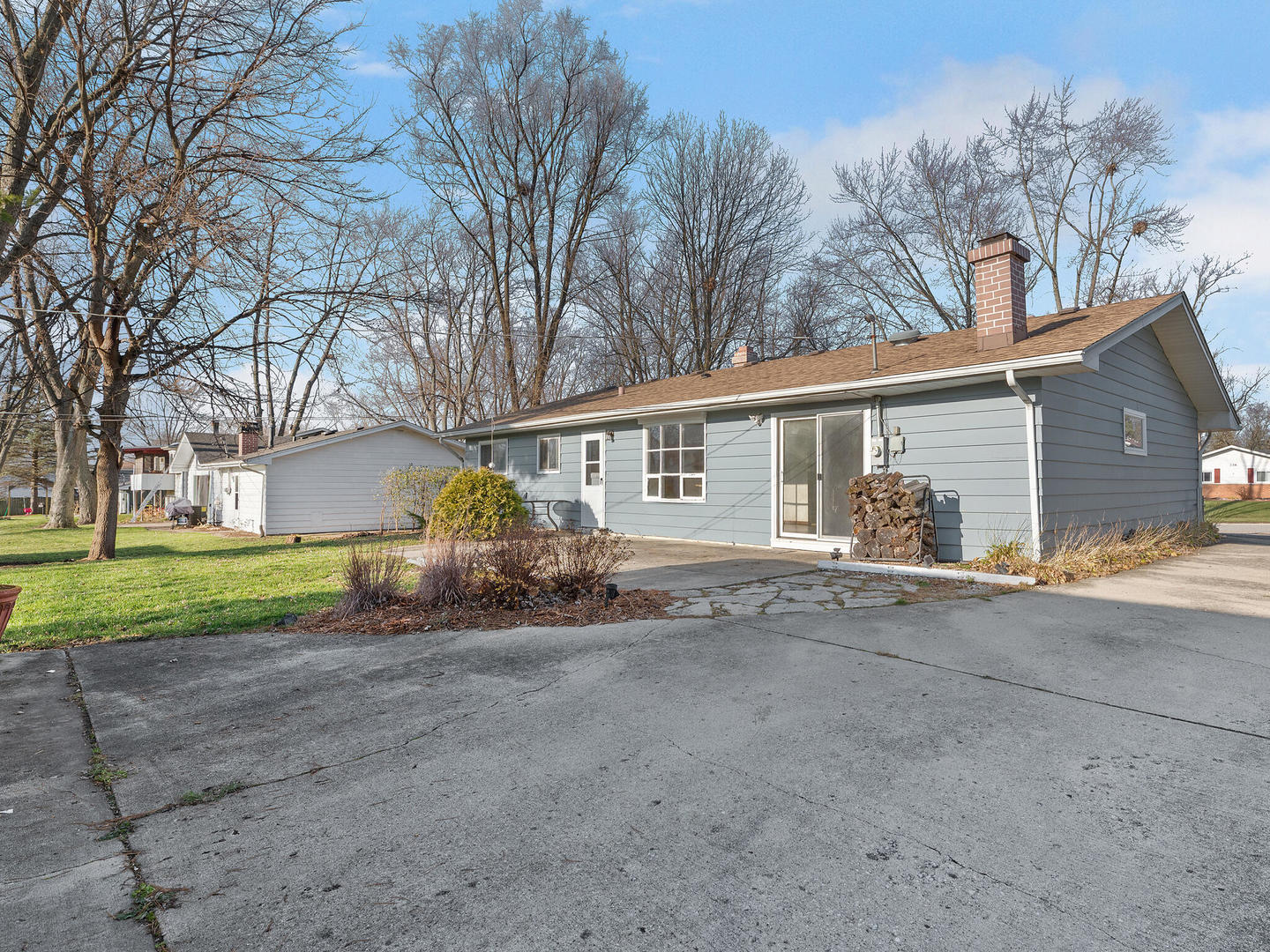 21W241 Coronet Road Lombard, IL 60148 - Photo 24 of 24 a view of a house with a yard and garage