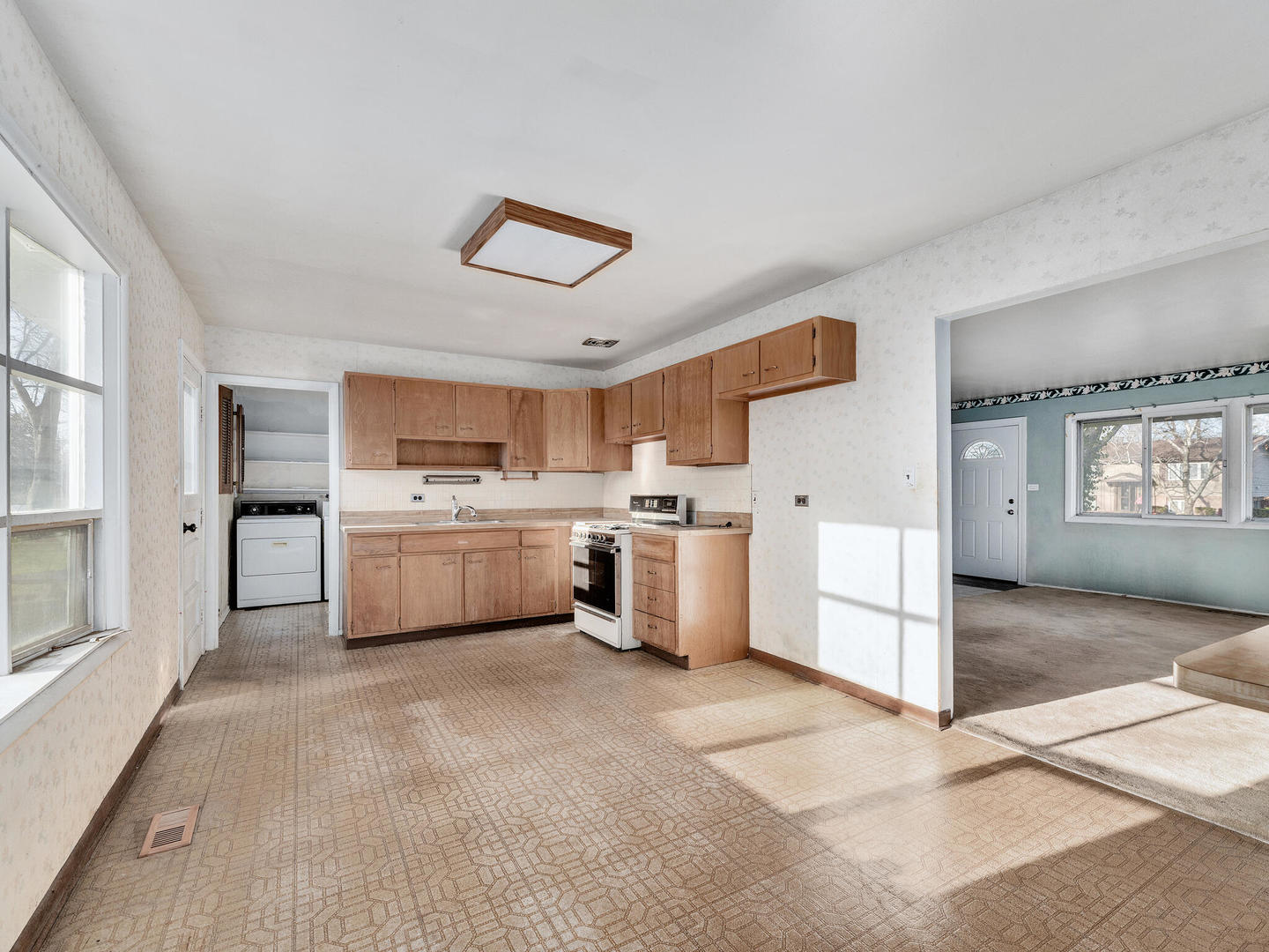 21W241 Coronet Road Lombard, IL 60148 - Photo 6 of 24 a view of a kitchen with appliances and cabinets