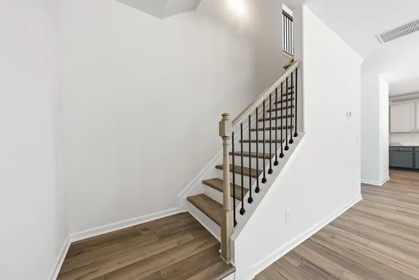 a view of entryway with wooden floor