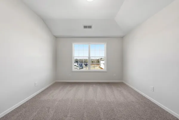 an empty room with a window