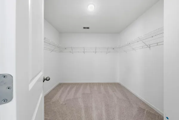 a view of a room with racks on the wall
