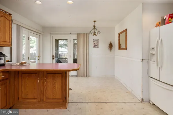 a kitchen with a sink stove and microwave