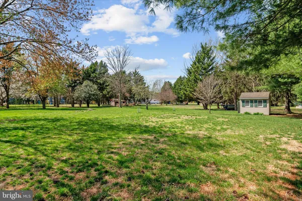 a view of a house with a big yard