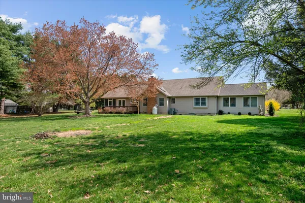 a view of a house with a big yard