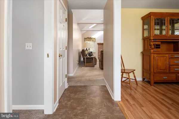 a view of a hallway with windows