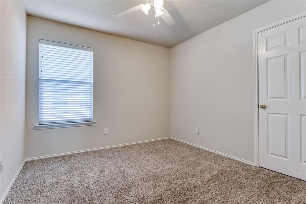 9710 Revolution Way Frisco, TX 75033 - Photo 21 of 25 an empty room with a window