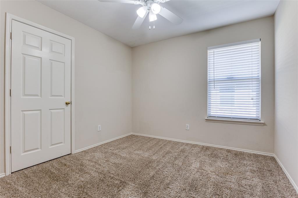 9710 Revolution Way Frisco, TX 75033 - Photo 22 of 25 a view of an empty room with a window