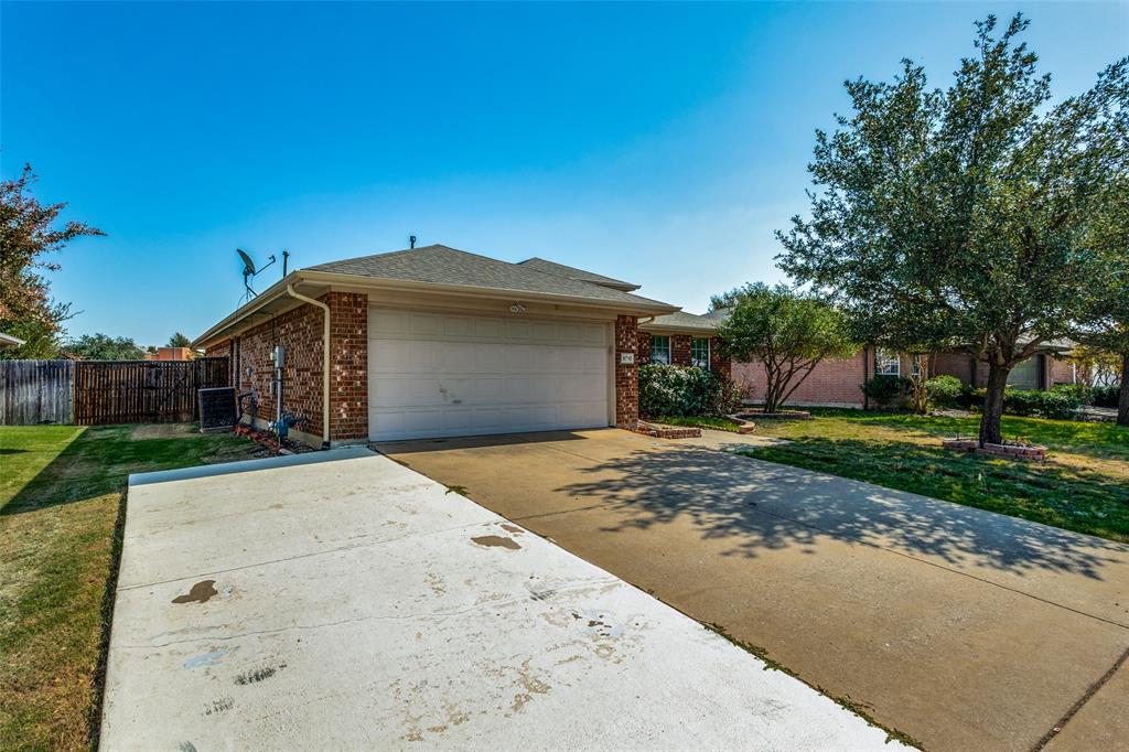 9710 Revolution Way Frisco, TX 75033 - Photo 7 of 25 a front view of a house with a yard