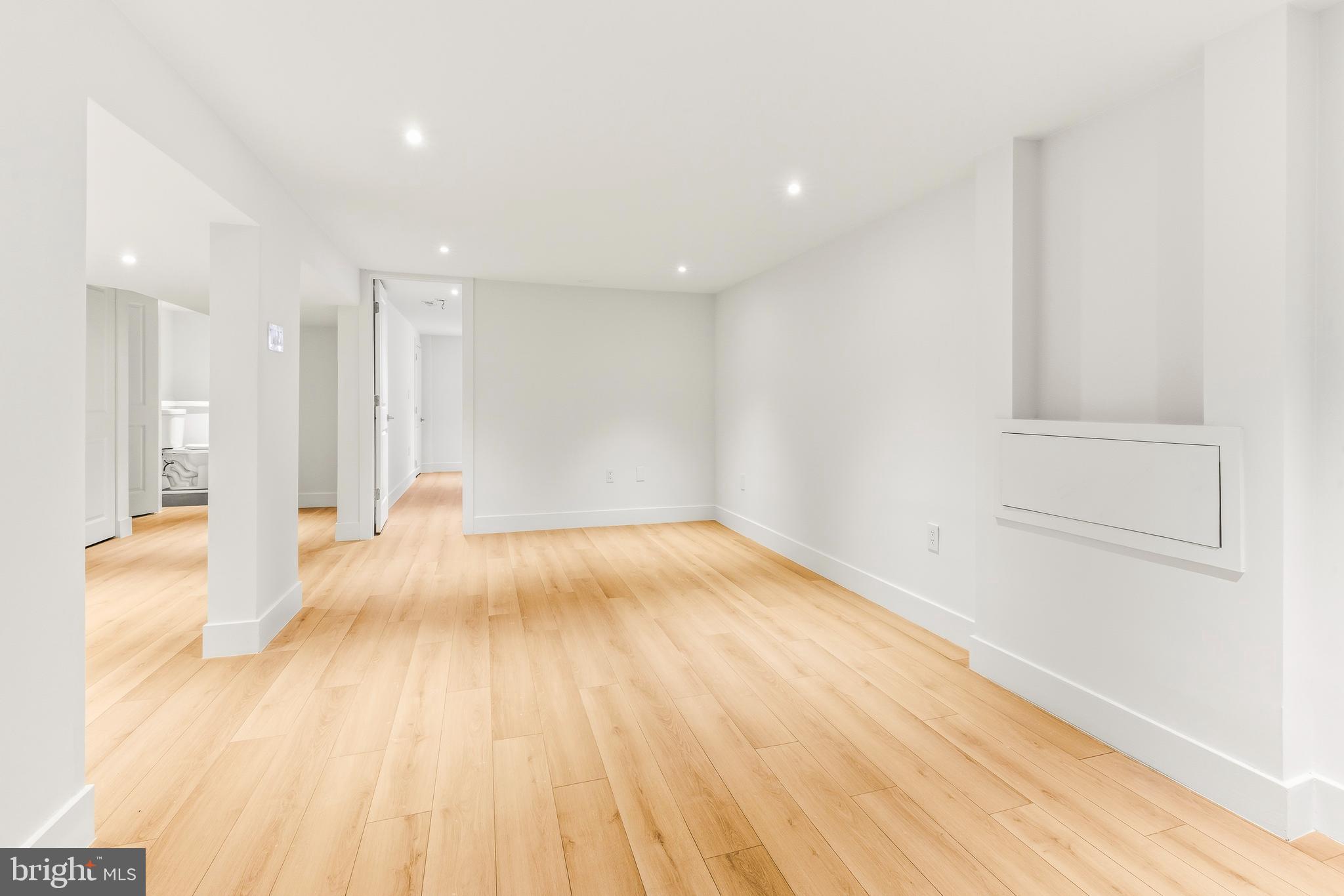 68 Craig Drive Deptford, NJ 08096 - Photo 17 of 20 a view of empty room with wooden floor