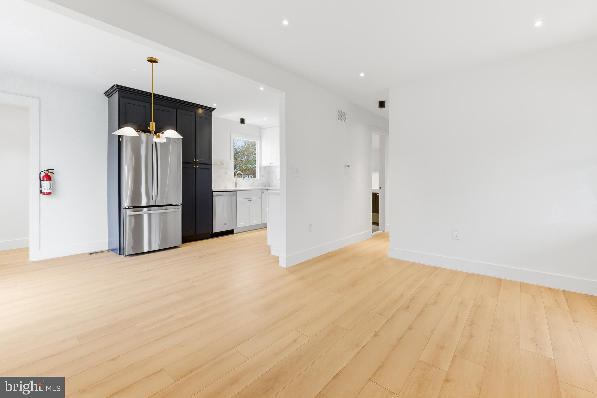 68 Craig Drive Deptford, NJ 08096 - Photo 4 of 20 a view of an empty room with a kitchen