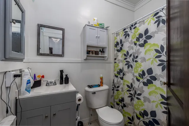 a bathroom with a sink and a toilet