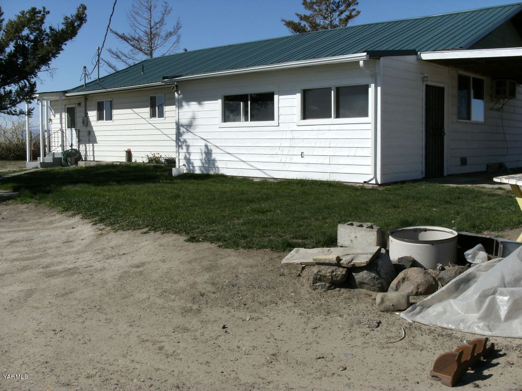 2270 Dekker Road Outlook, WA 98938 - Photo 1 of 6 a view of backyard of house and outdoor seating