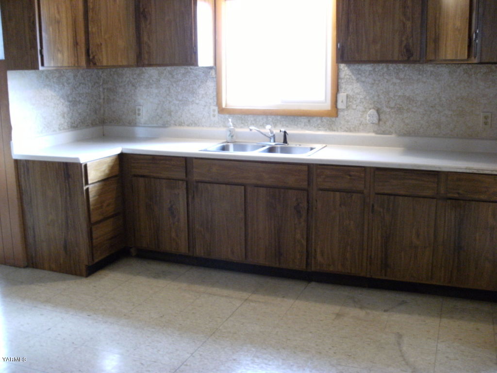 2270 Dekker Road Outlook, WA 98938 - Photo 6 of 6 a kitchen with a sink cabinets and a stove top oven