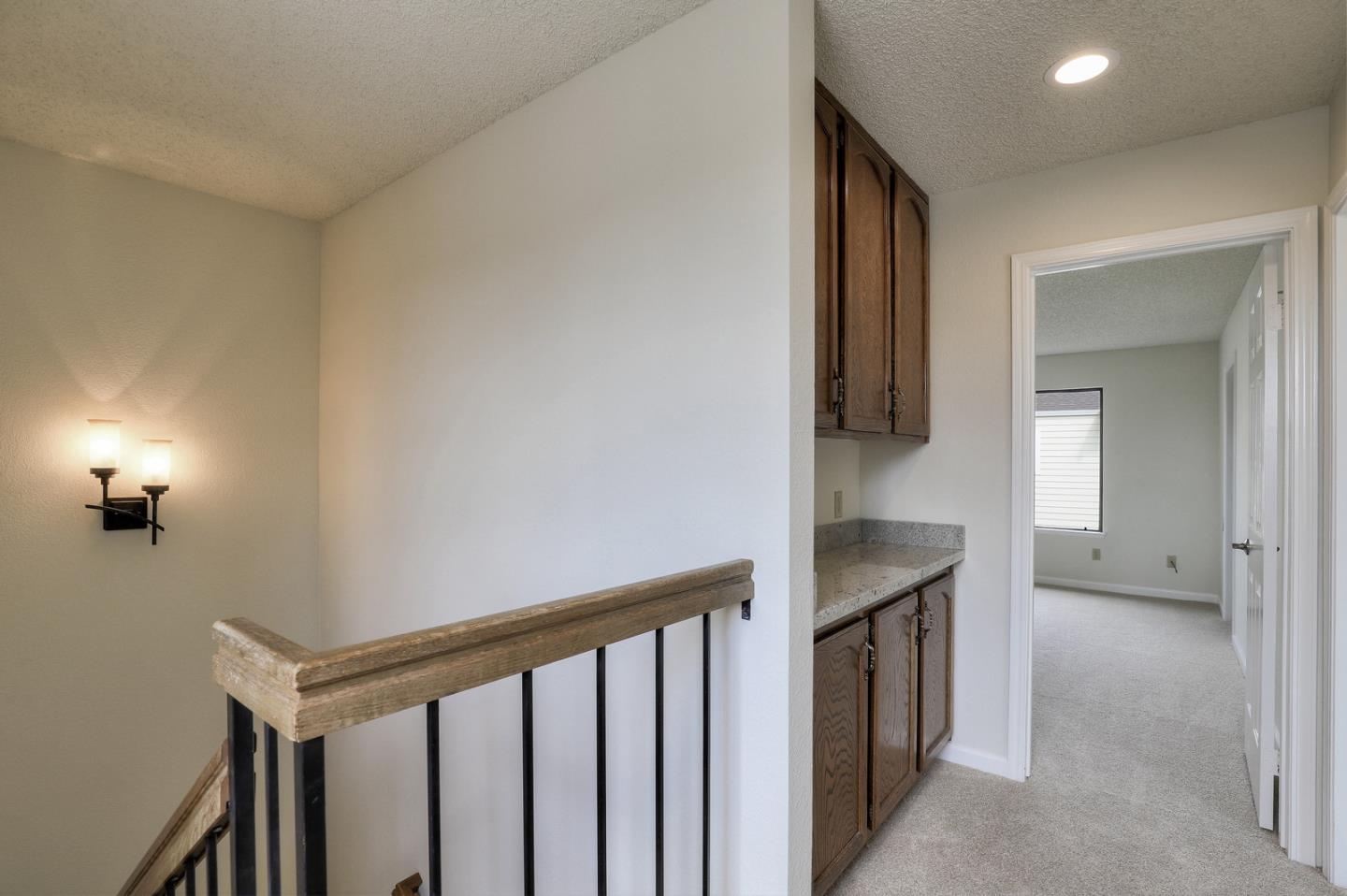 271 Michigan Road Milpitas, CA 95035 - Photo 18 of 34 a view of a hallway with workspace