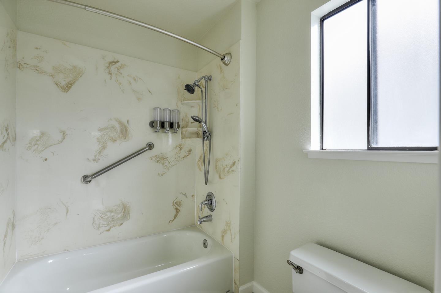 271 Michigan Road Milpitas, CA 95035 - Photo 24 of 34 a bathroom with a bathtub and a shower