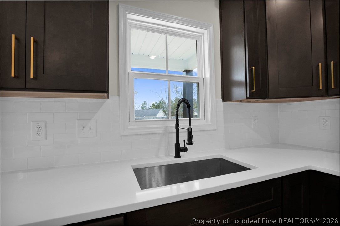 116 Surveyor Street Raeford, NC 28376 - Photo 16 of 45 a view of cabinets and chair