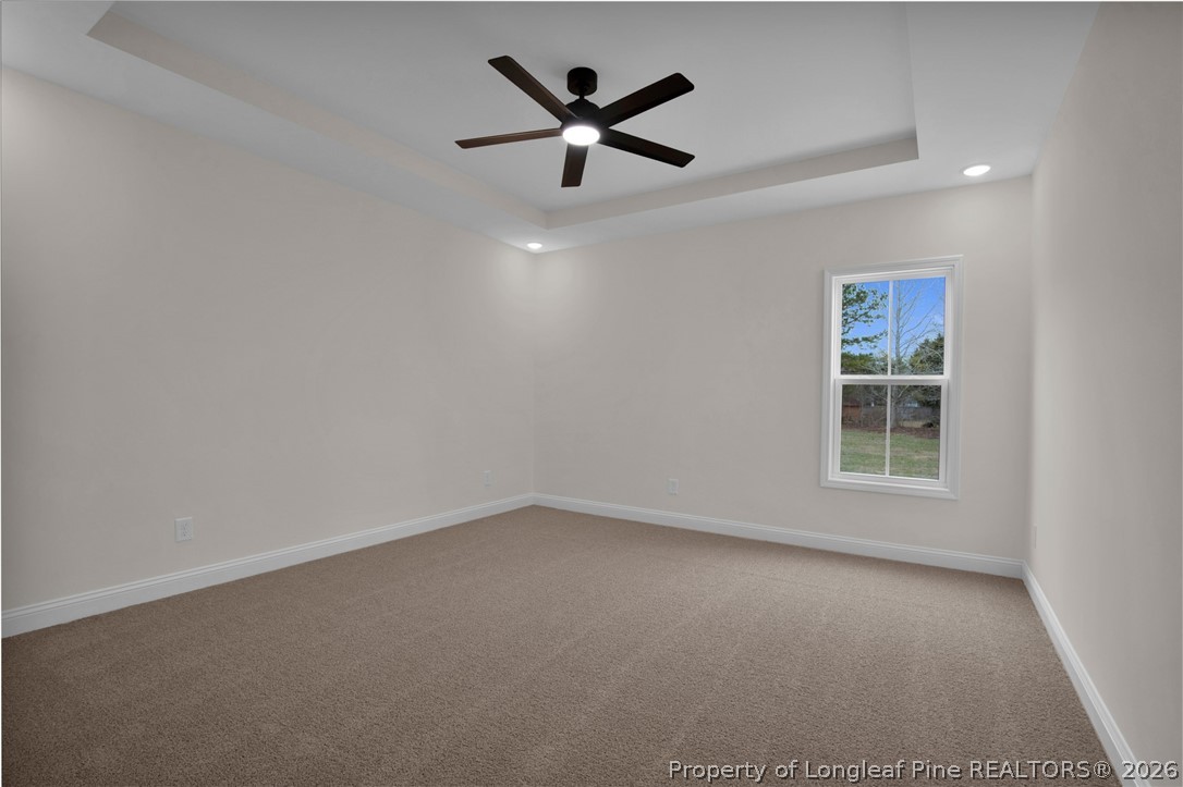116 Surveyor Street Raeford, NC 28376 - Photo 21 of 45 an empty room with ceiling fan and window