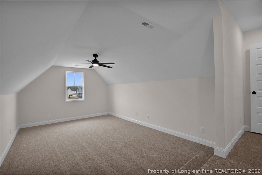 116 Surveyor Street Raeford, NC 28376 - Photo 27 of 45 an empty room with a ceiling fan and a window