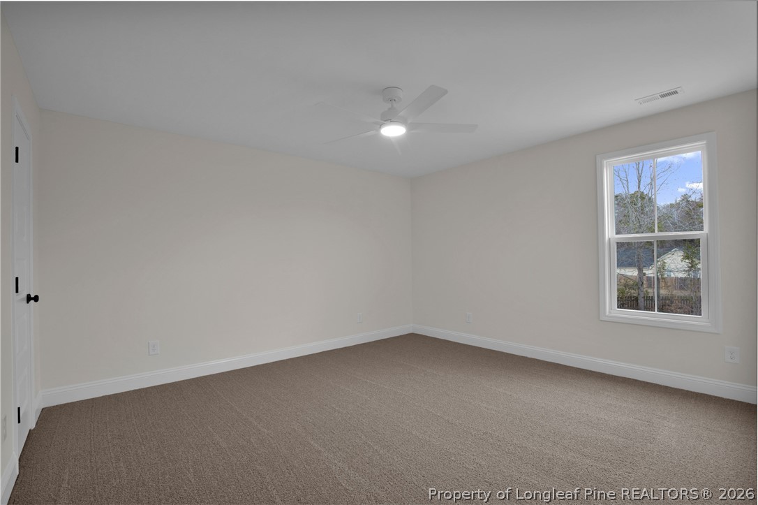 116 Surveyor Street Raeford, NC 28376 - Photo 30 of 45 an empty room with a window