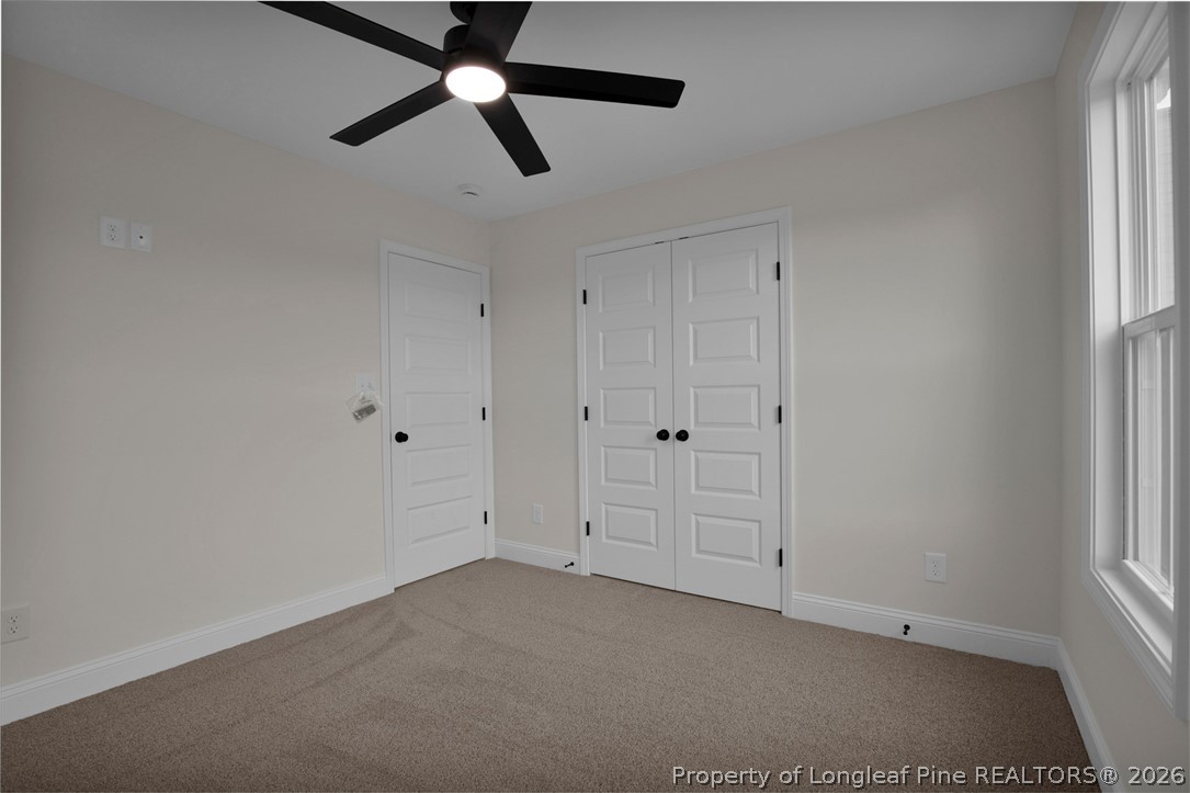 116 Surveyor Street Raeford, NC 28376 - Photo 34 of 45 a view of an empty room with a window