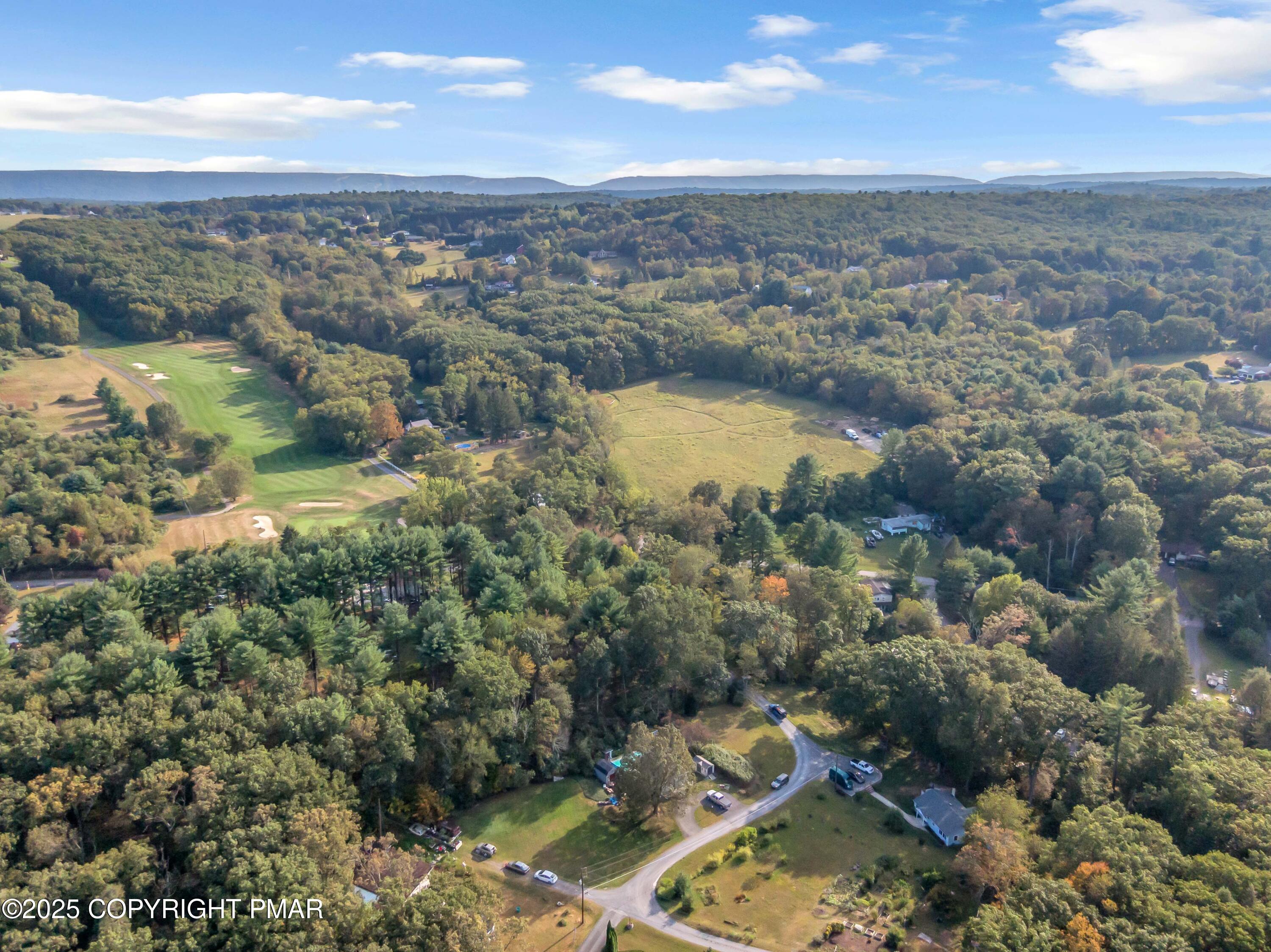 117 Streamside Street Kunkletown, PA 18058 - Photo 16 of 37 an aerial view of a house with a lake view