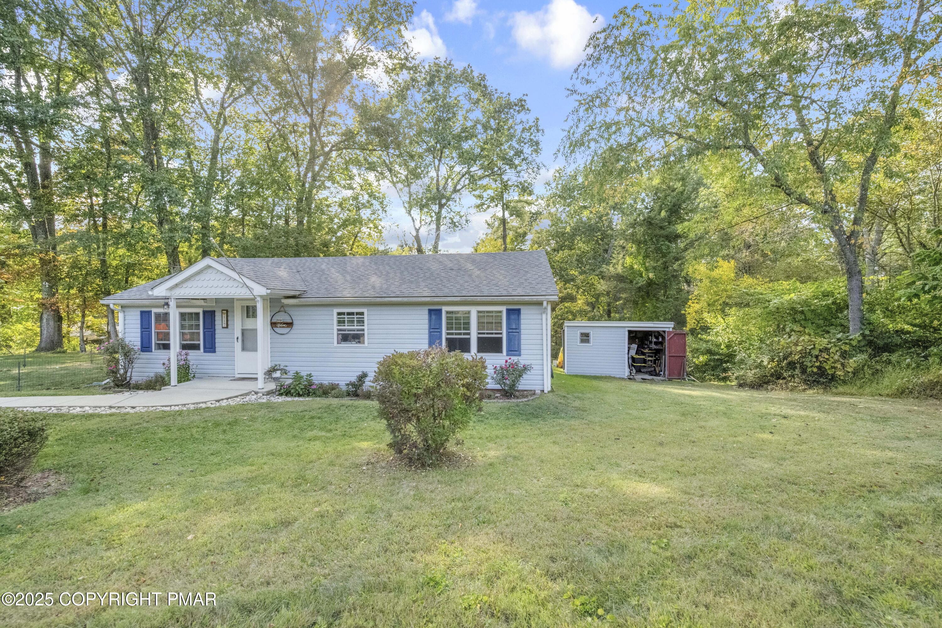 117 Streamside Street Kunkletown, PA 18058 - Photo 2 of 37 a house that has a tree in front of the house