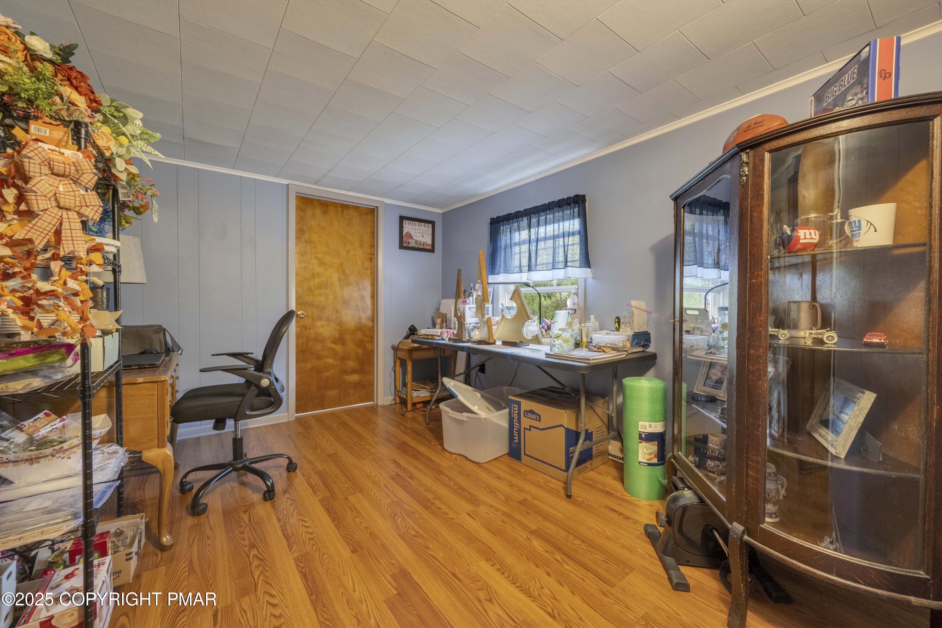 117 Streamside Street Kunkletown, PA 18058 - Photo 24 of 37 a view of a workspace with furniture and a window