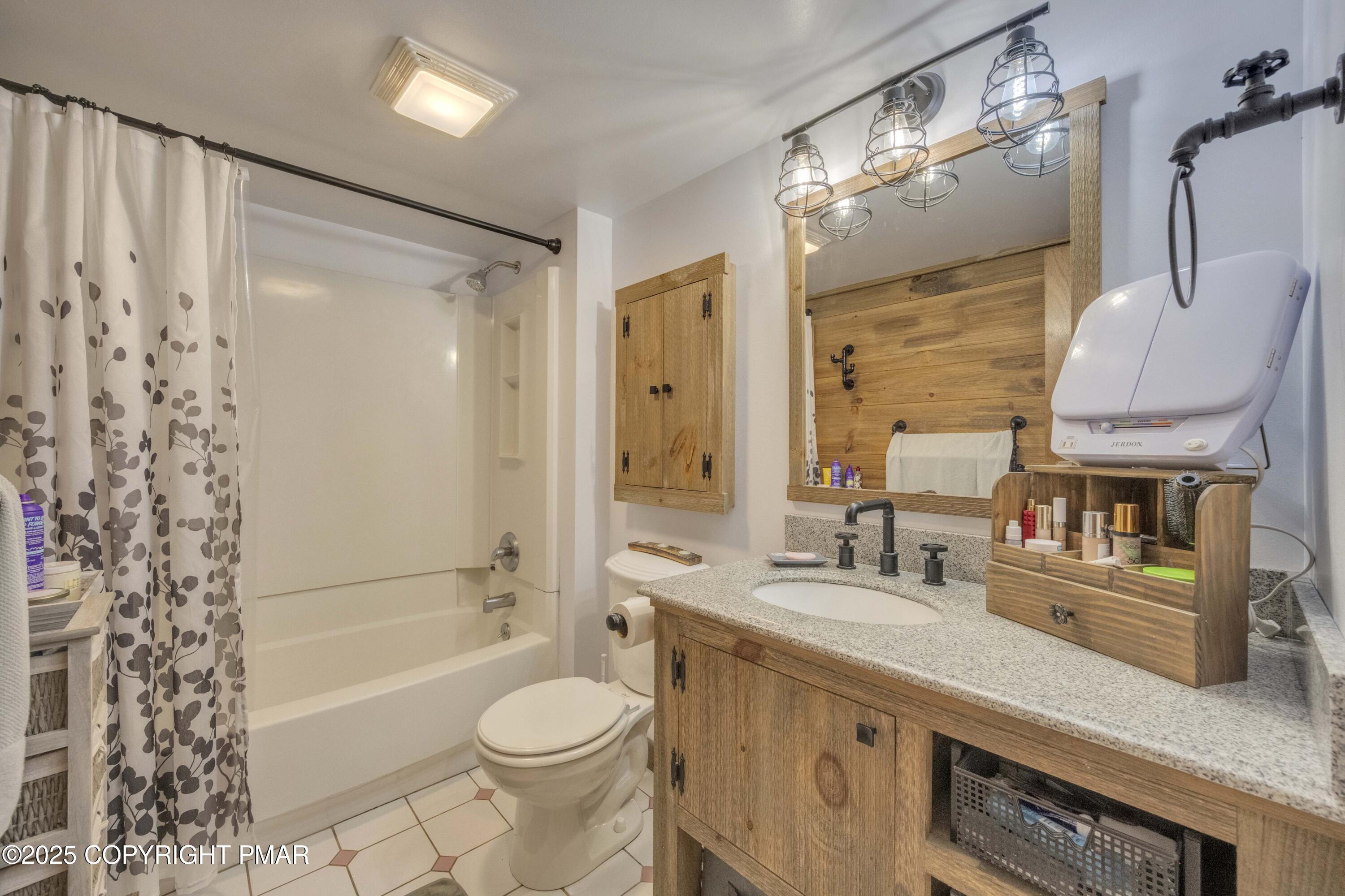 117 Streamside Street Kunkletown, PA 18058 - Photo 27 of 37 a bathroom with a granite countertop sink toilet and shower