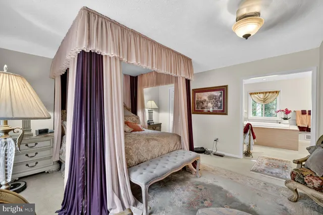 a dining room with furniture water view and wooden floor